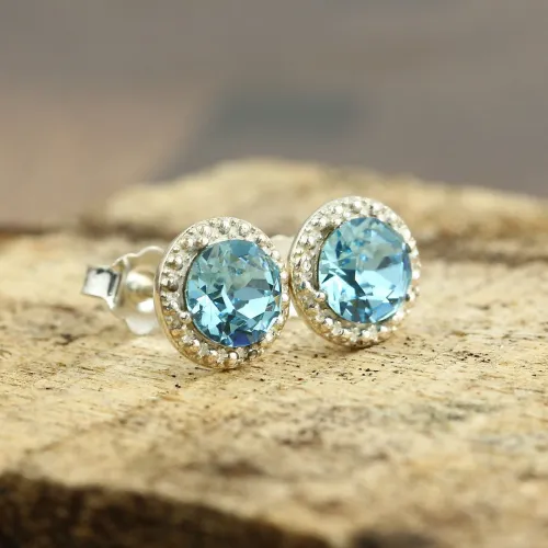 Aquamarine ring in a cozy winter setting