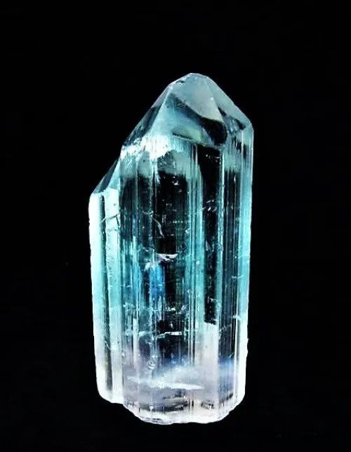 Comparison of aquamarine stones showing range from light to deep blue tones