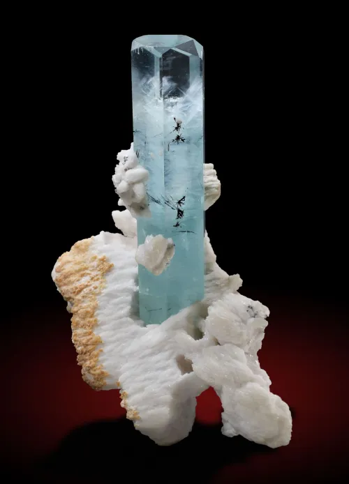 Comparison: Pale aquamarine versus white quartz under magnification