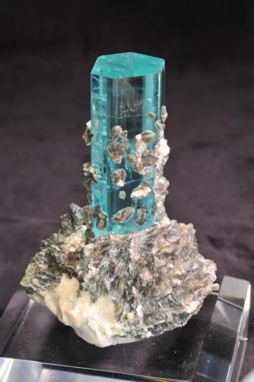 Aquamarine crystal exhibiting light refraction and watery optical effects